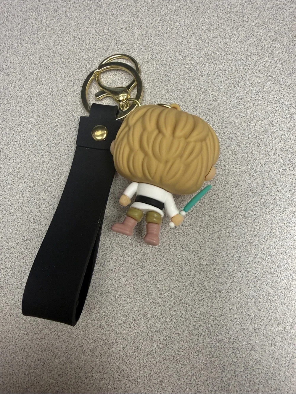 Funko Pop Star Wars Luke Skywalker Keychain with Black Strap and Gold Hardware